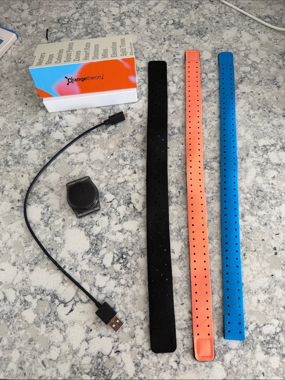 Orangetheory Tracker with Black, Orange, and Blue Interchangeable Bands